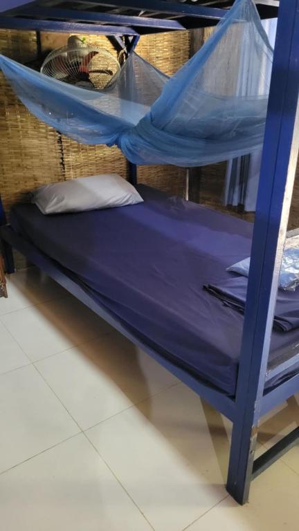 Postel nebo postele na pokoji v ubytování CocoHuts