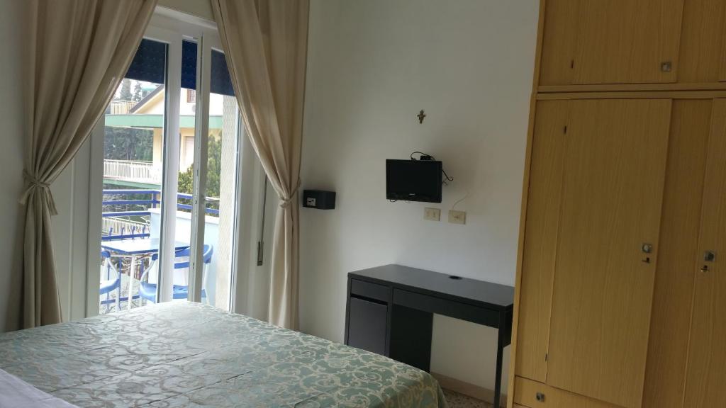 Postel nebo postele na pokoji v ubytování Hotel Canasta