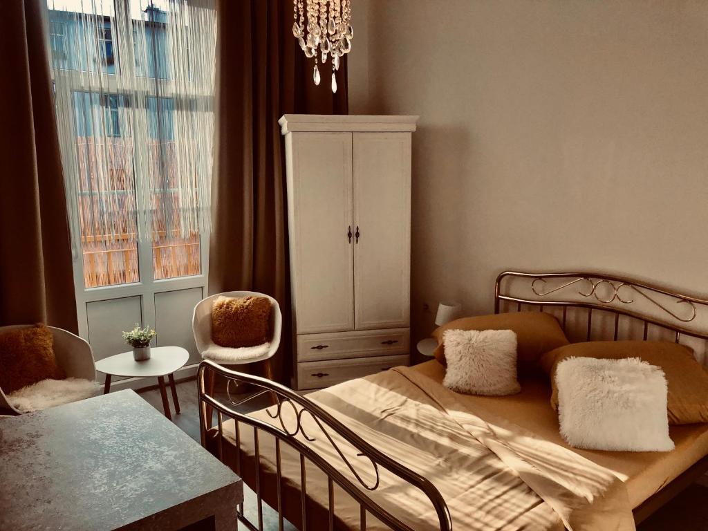Postel nebo postele na pokoji v ubytování Tomas Apartments Silver