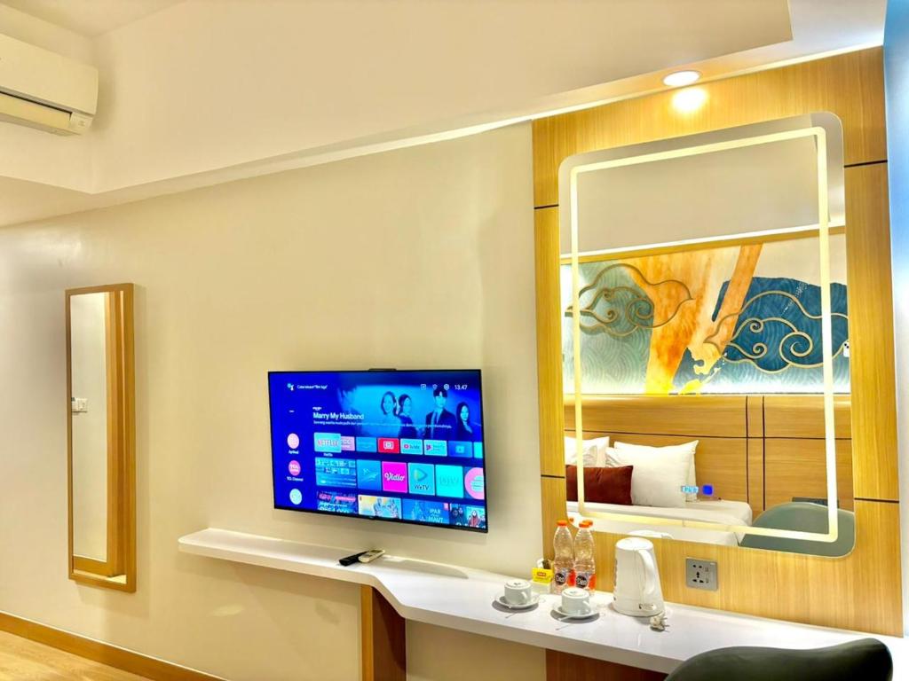 TV a/nebo společenská místnost v ubytování Metland Hotel Cirebon