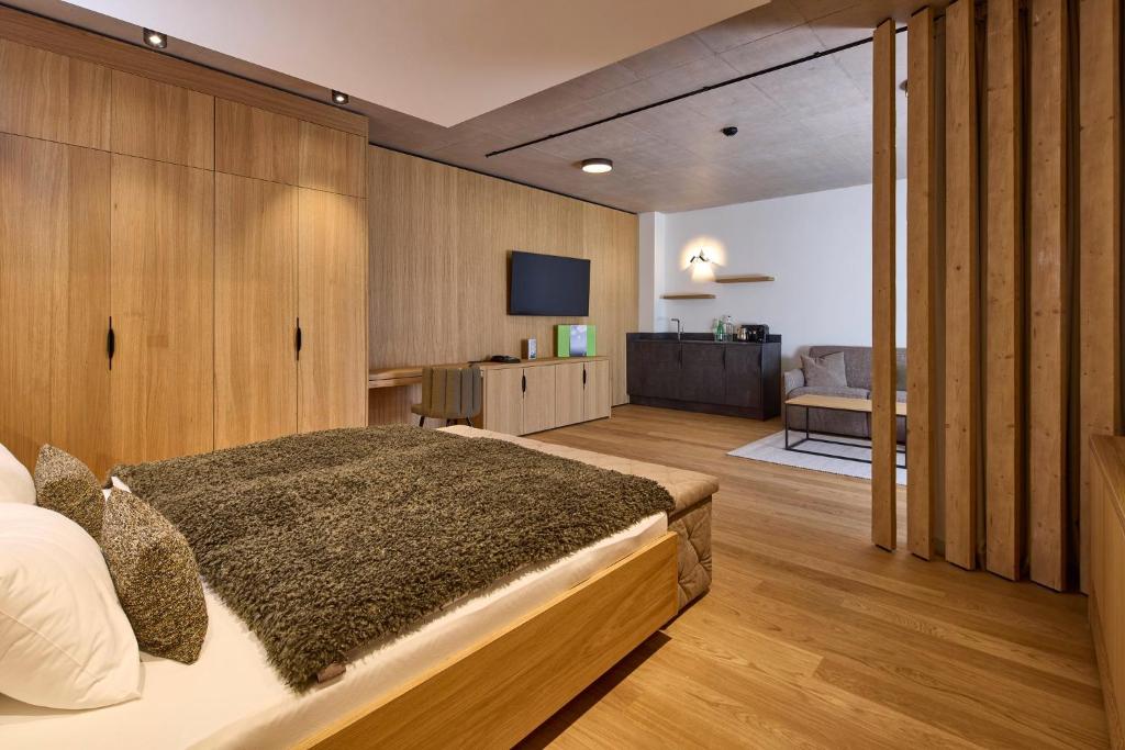 TV a/nebo společenská místnost v ubytování Das Walchsee Aktivresort