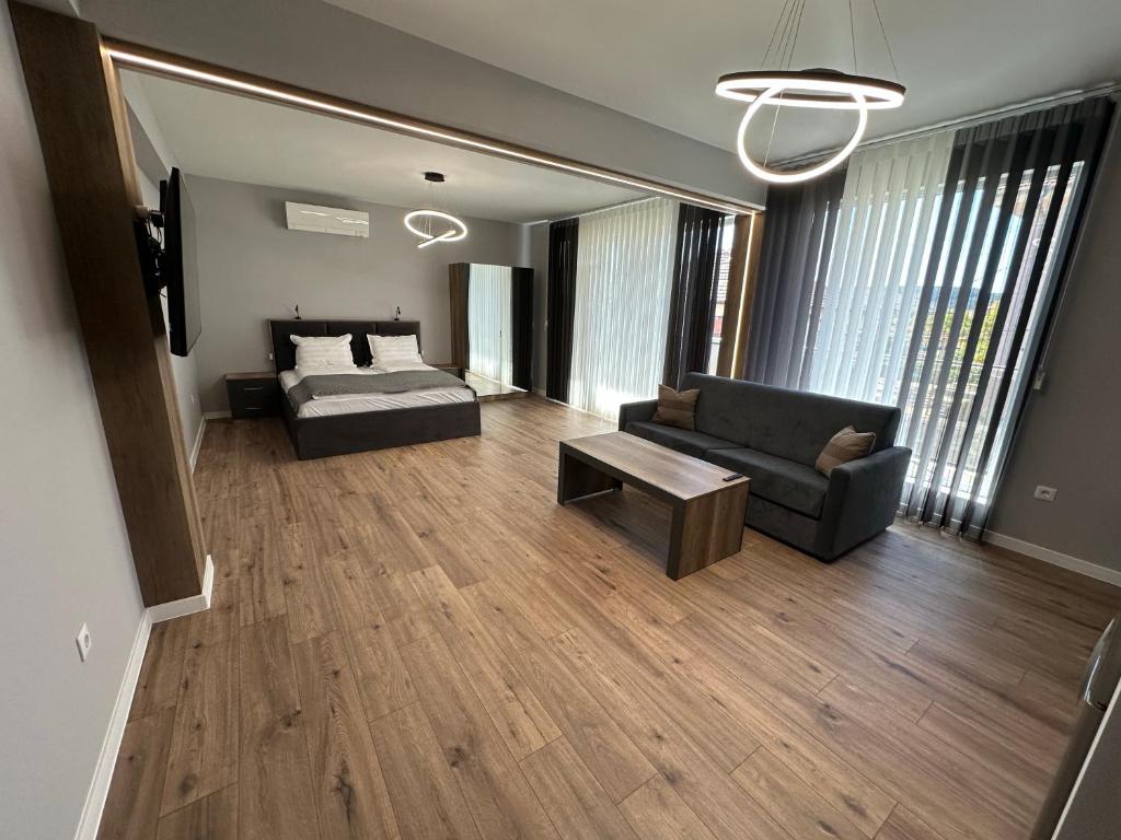 Postel nebo postele na pokoji v ubytování Vimar Apartments