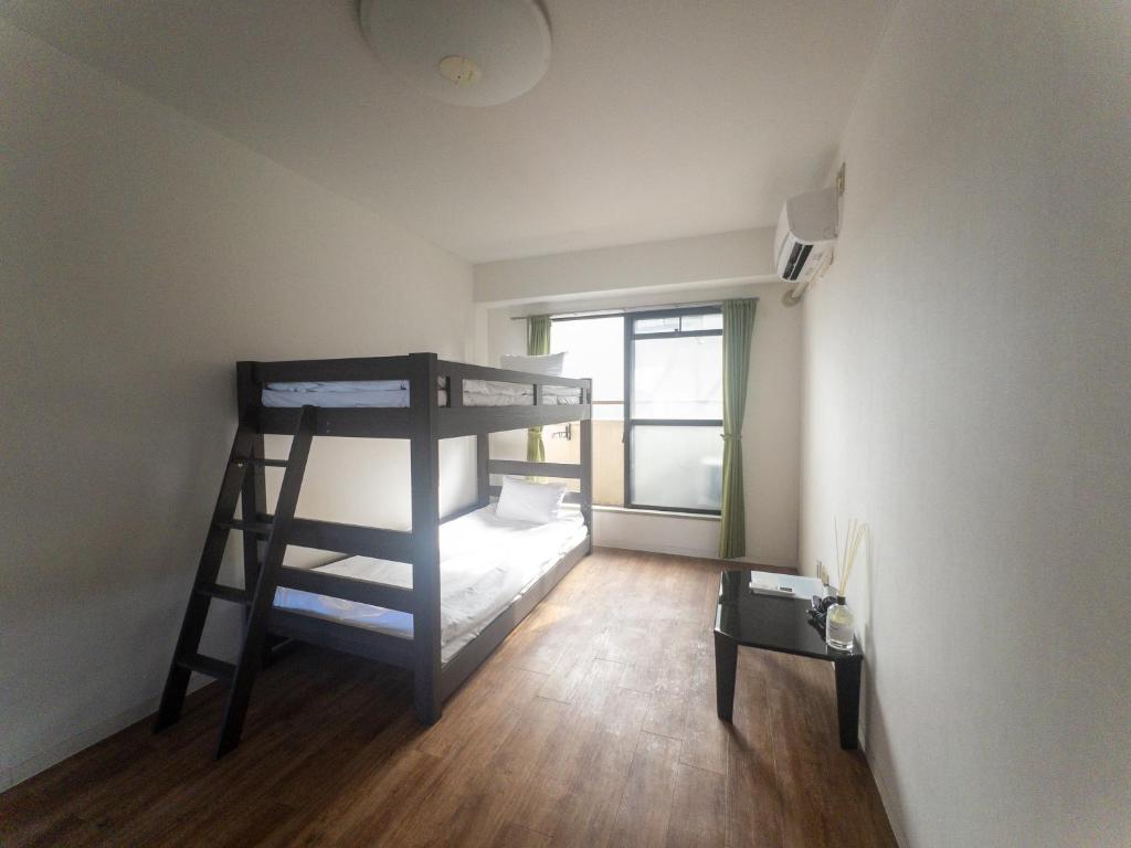 Postel nebo postele na pokoji v ubytování HARMONY HOTEL Urawa