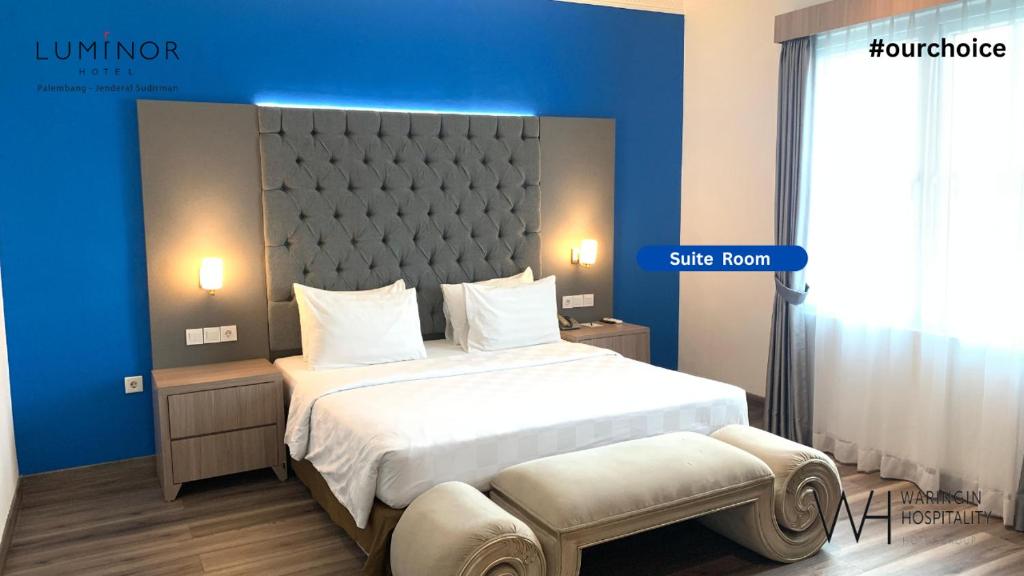 Postel nebo postele na pokoji v ubytování Luminor Hotel Palembang by WH Free Massage 10 Minutes