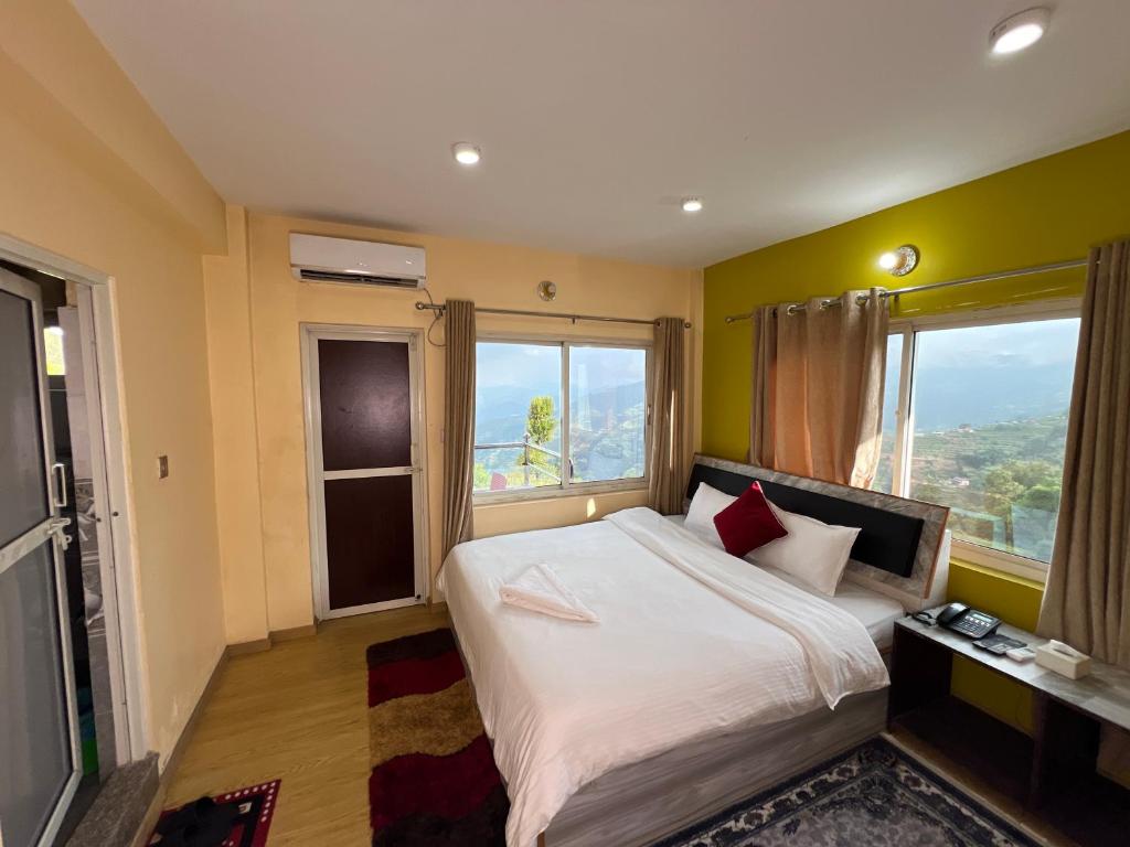 Postel nebo postele na pokoji v ubytování Hotel Village View Nagarkot