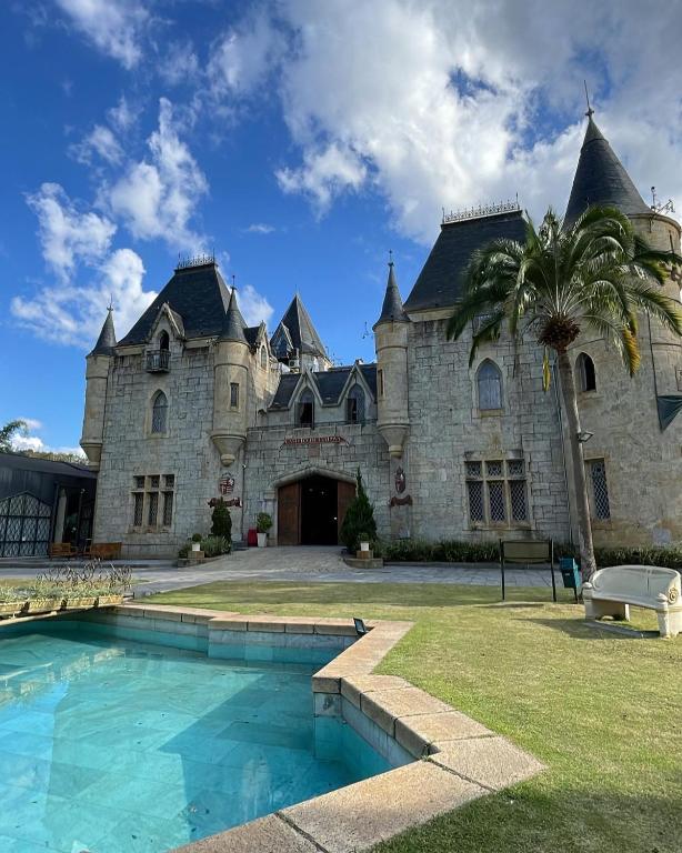 Swimmingpoolen hos eller tæt på Apartamento em Itaipava