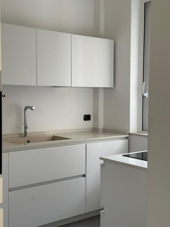 A kitchen or kitchenette at Villa Savoia Mondello