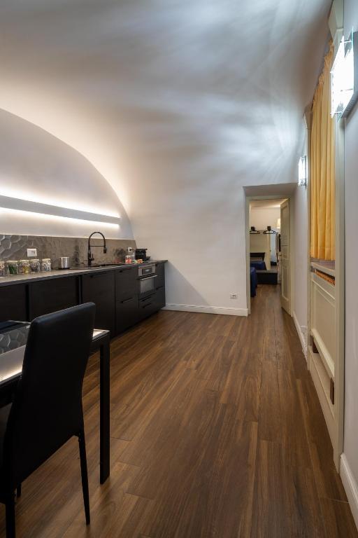 A television and/or entertainment centre at Le Piccole Lune di Monti