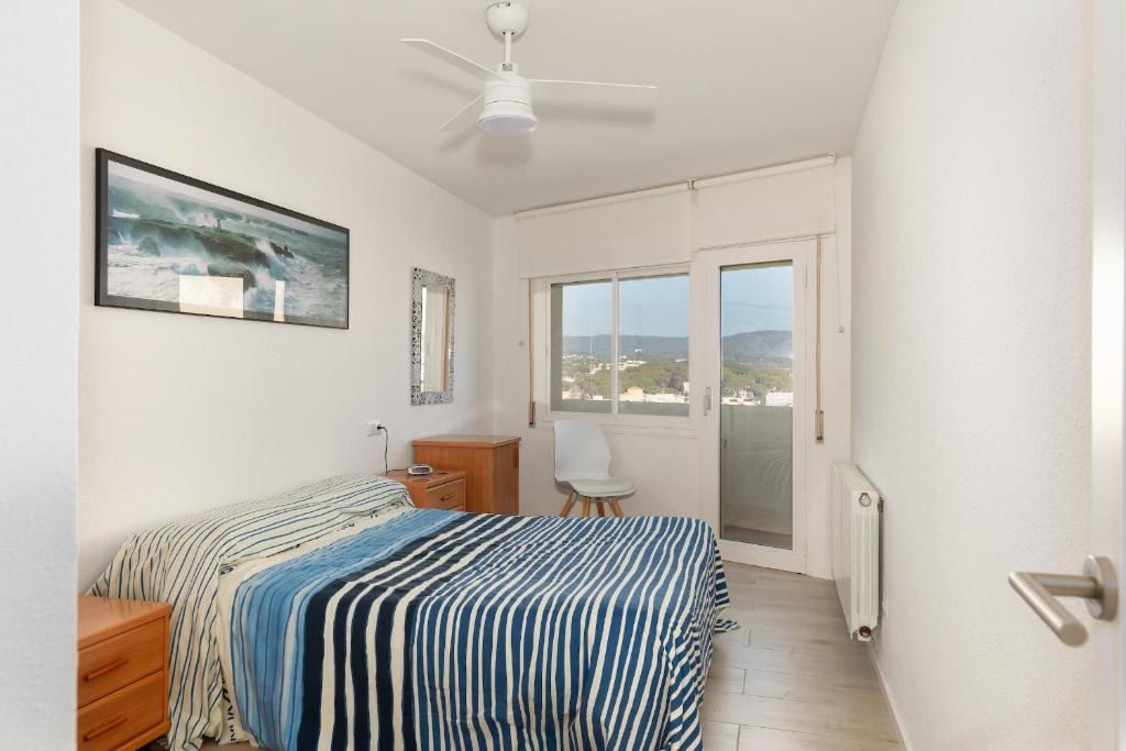 Postel nebo postele na pokoji v ubytování Hauzify I Apartaments SuperBeach