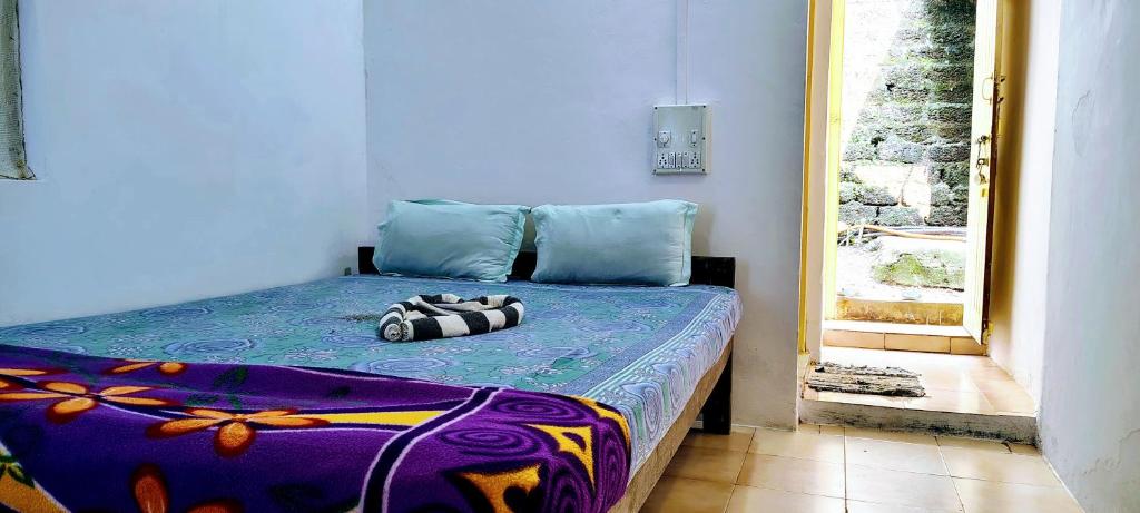 Postel nebo postele na pokoji v ubytování SUNNY CLIFF BEACH Stay