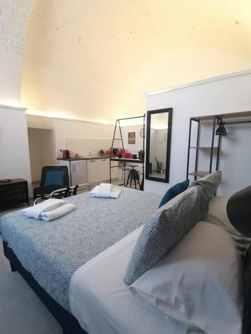 Postel nebo postele na pokoji v ubytování Casa dei Nonni Loft