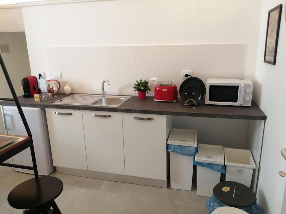 Kuchyň nebo kuchyňský kout v ubytování Casa dei Nonni Loft