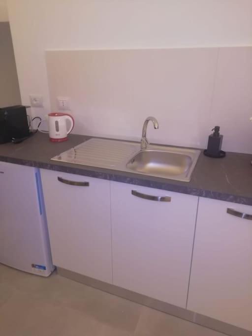 Kuchyň nebo kuchyňský kout v ubytování Casa dei Nonni Loft