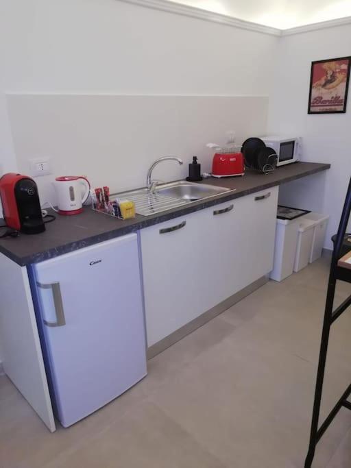 Kuchyň nebo kuchyňský kout v ubytování Casa dei Nonni Loft