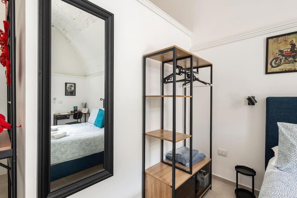 Postel nebo postele na pokoji v ubytování Casa dei Nonni Loft