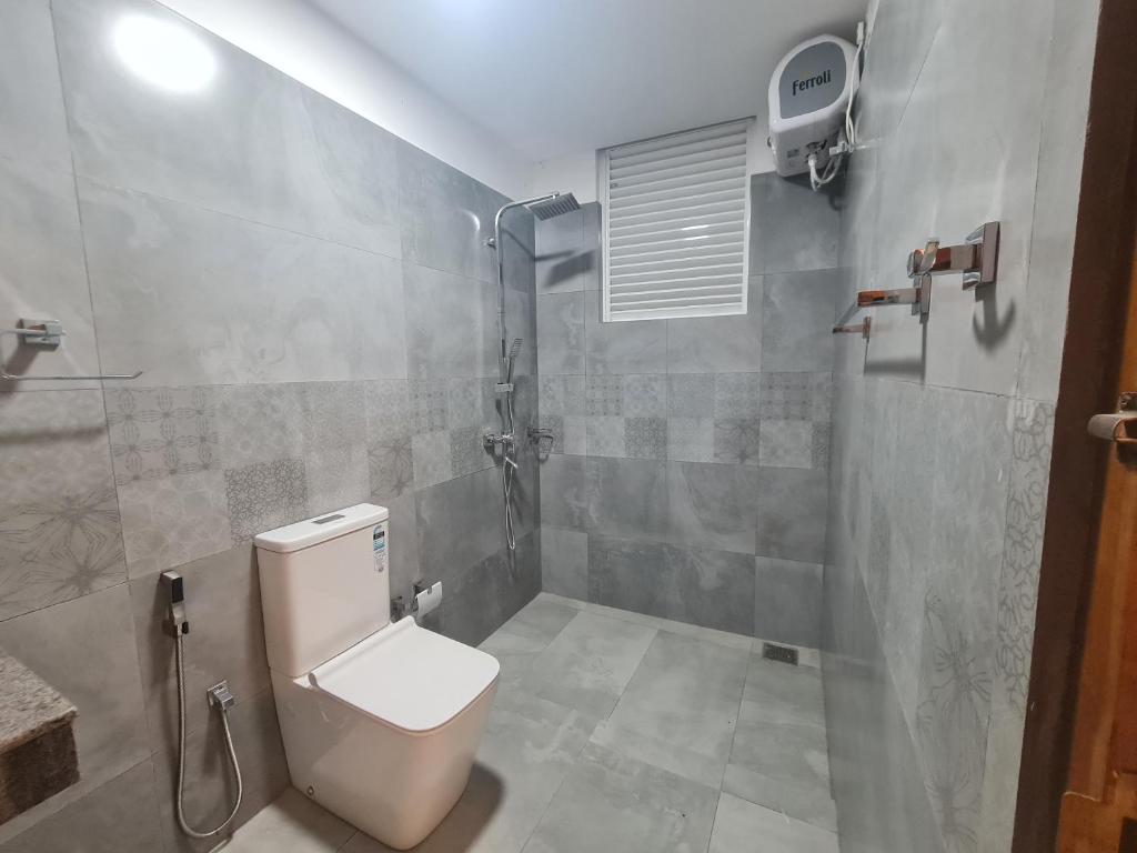 Koupelna v ubytování Kandy Breeze City Hotel