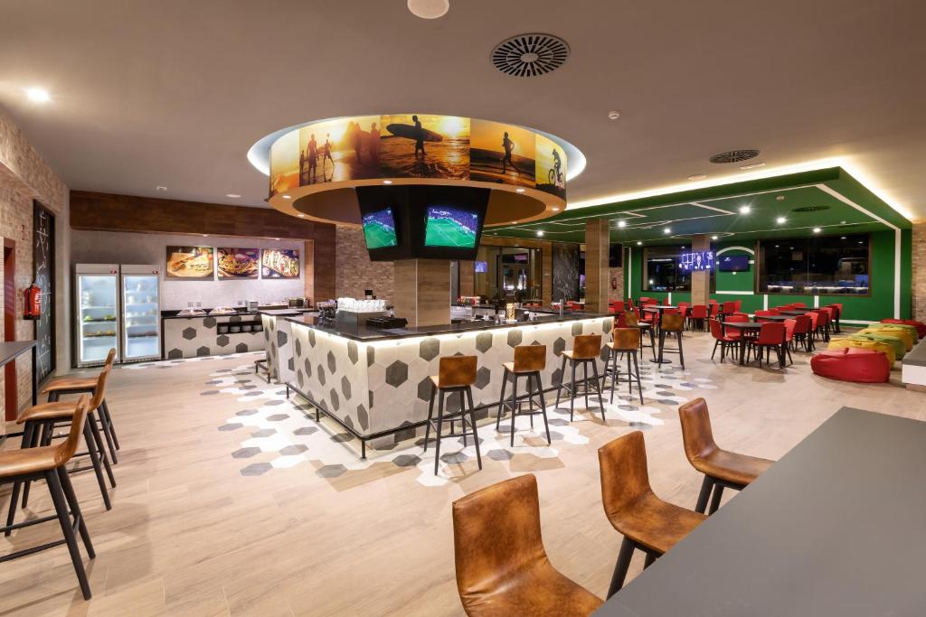 TV a/nebo společenská místnost v ubytování Hotel Riu Palace Boavista - All Inclusive