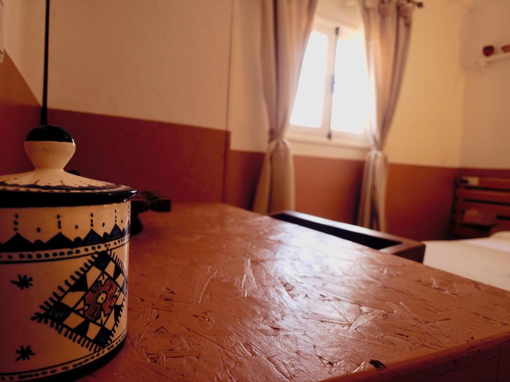 Postel nebo postele na pokoji v ubytování Tazuri Surf House