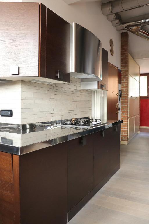 Kuchyň nebo kuchyňský kout v ubytování La Corte di Brusuglio Apartments