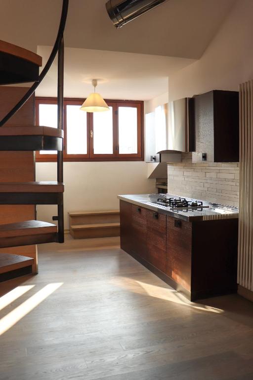 Kuchyň nebo kuchyňský kout v ubytování La Corte di Brusuglio Apartments