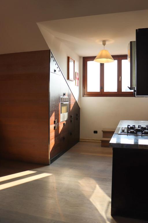 Kuchyň nebo kuchyňský kout v ubytování La Corte di Brusuglio Apartments
