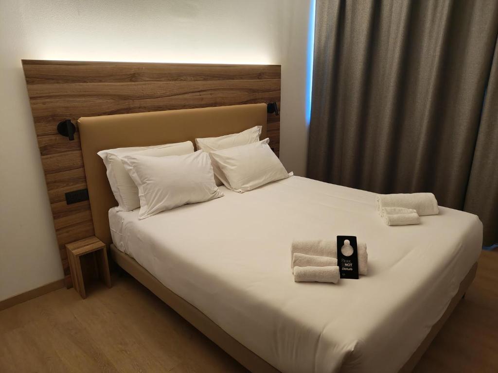 B&B HOTEL Prato City Centerにあるベッド