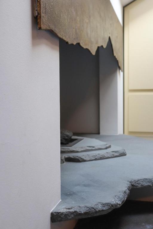 Postel nebo postele na pokoji v ubytování La Corte di Brusuglio Apartments