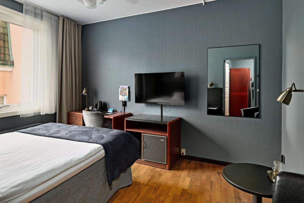 Postel nebo postele na pokoji v ubytování Best Western Centralhotellet