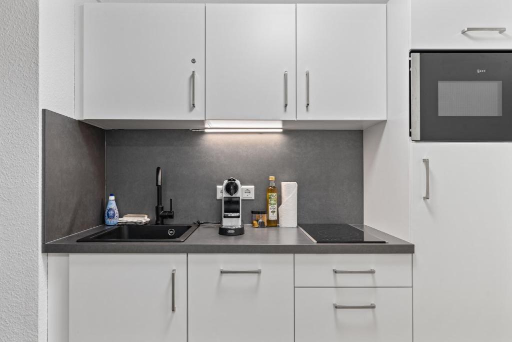 Cucina o angolo cottura di Ankerherz Appartements bei Blankenese