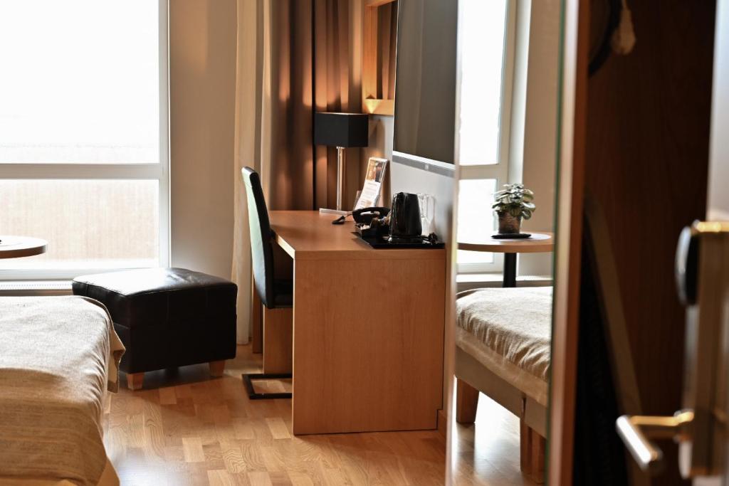 Postel nebo postele na pokoji v ubytování Hotel Frøya