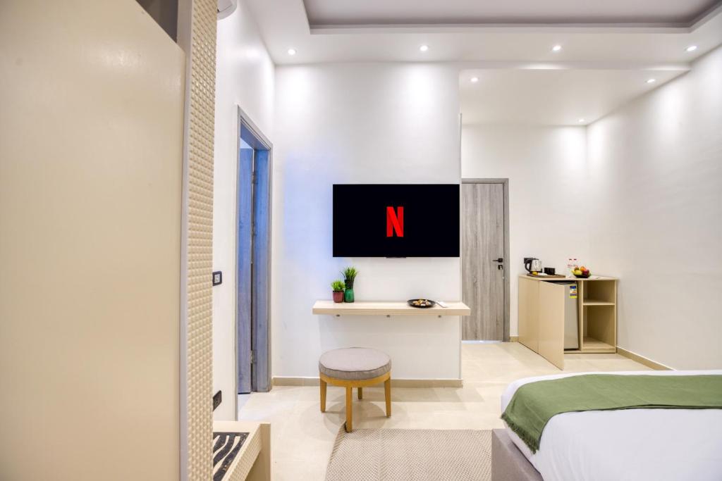 Postel nebo postele na pokoji v ubytování Seven Stays Zayed