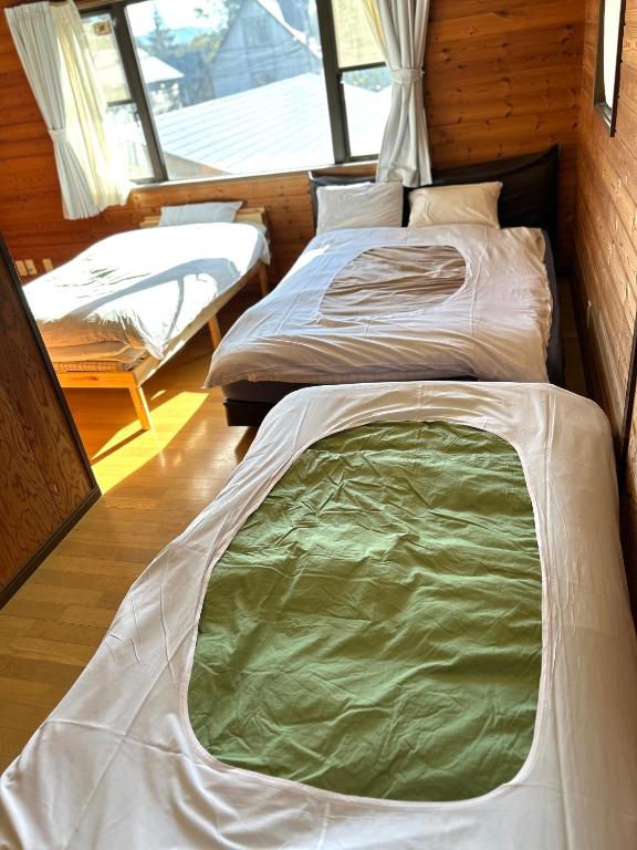 Postel nebo postele na pokoji v ubytování heyza