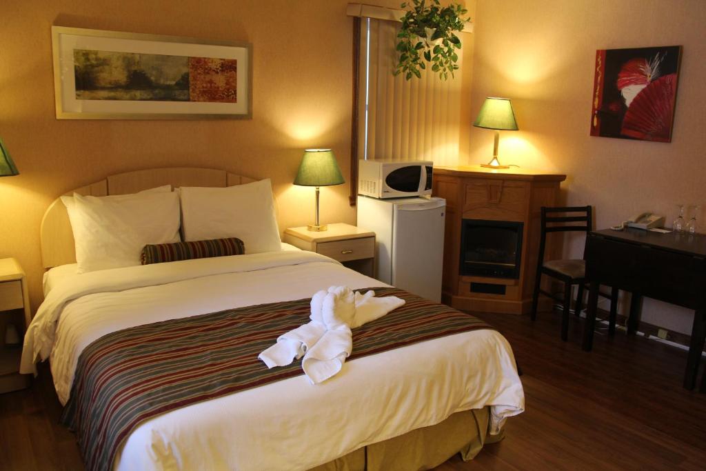 Postel nebo postele na pokoji v ubytování Motel Chantolac