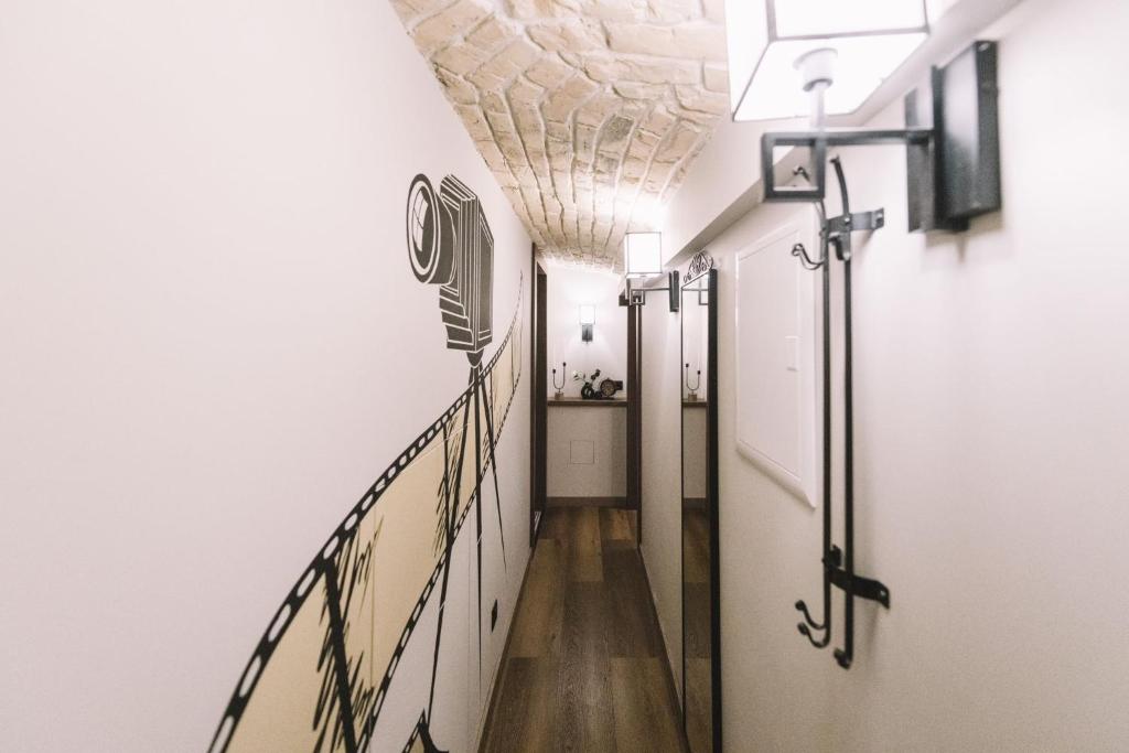 a hallway with a stairway in a building at Photographer Rudolf's Studio - ground floor with separate entrance in Rīga