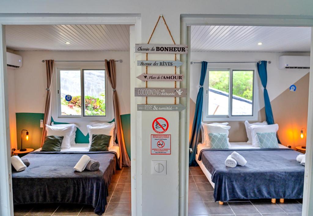 Postel nebo postele na pokoji v ubytování Villa Lanati cosy, piscine privative & vue mer
