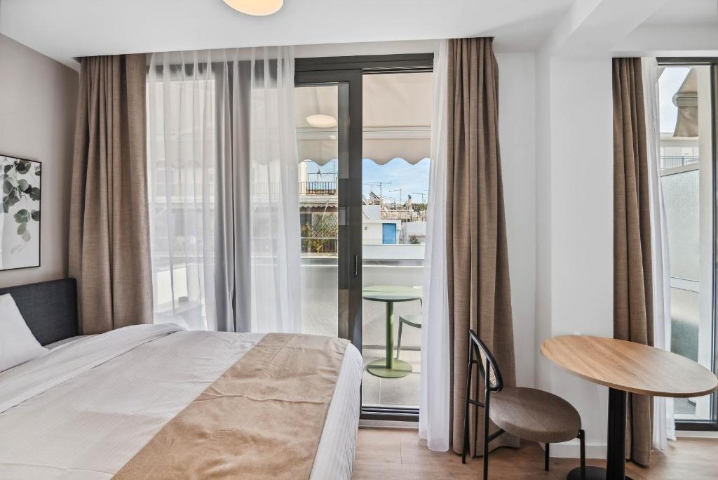 Postel nebo postele na pokoji v ubytování limehome Piraeus Olive