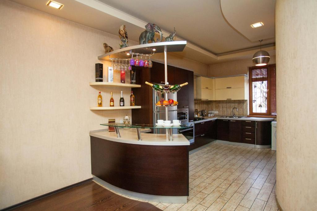Kuchyň nebo kuchyňský kout v ubytování Hotel 4You