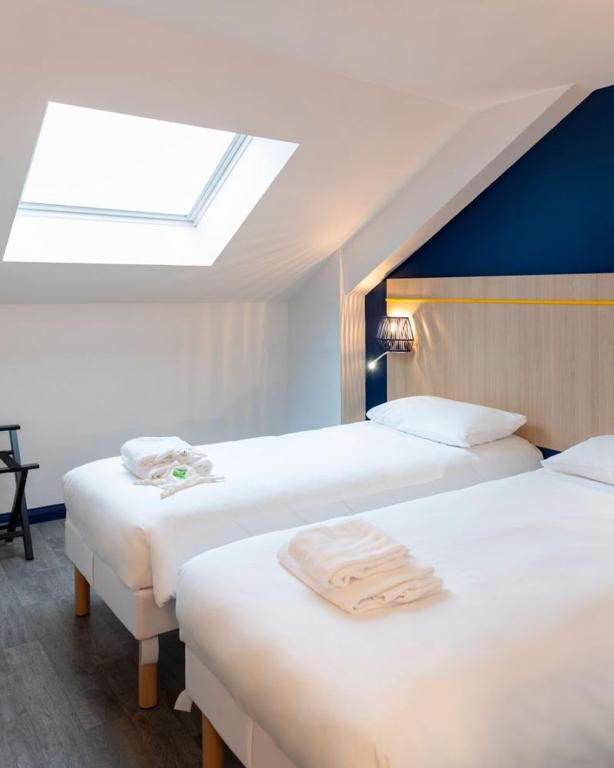 Postel nebo postele na pokoji v ubytování ibis Styles Morlaix