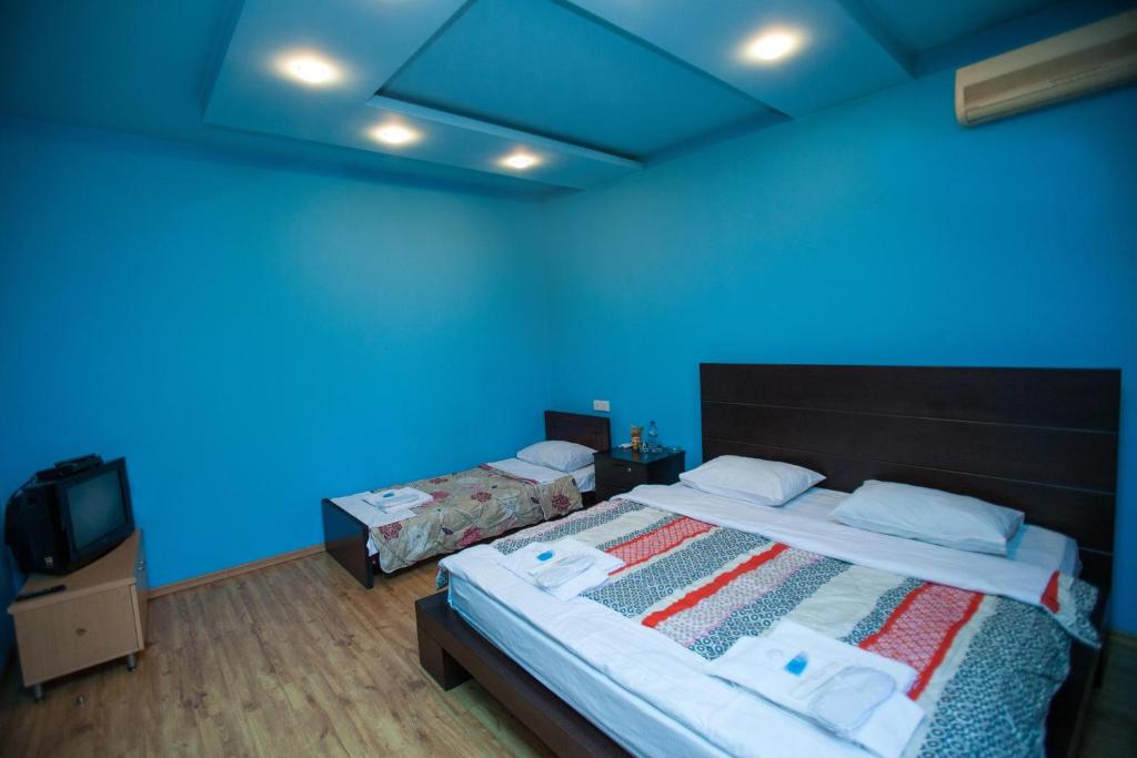 Postel nebo postele na pokoji v ubytování Hotel 4You