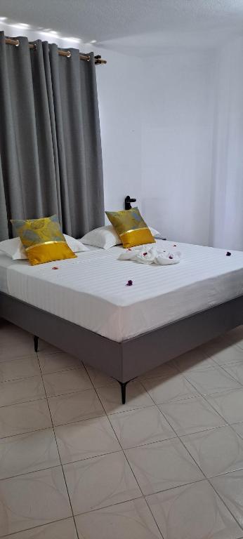 Postel nebo postele na pokoji v ubytování La Plage Residence