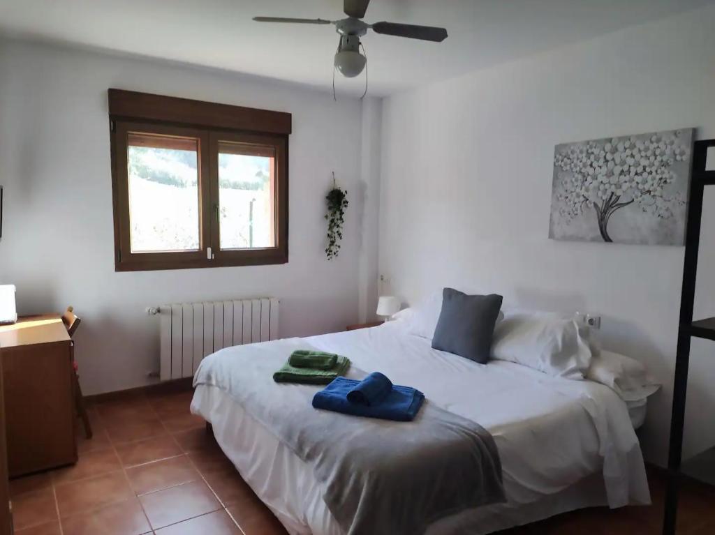 Postel nebo postele na pokoji v ubytování Casa Rural La Churla en Mazcuerras