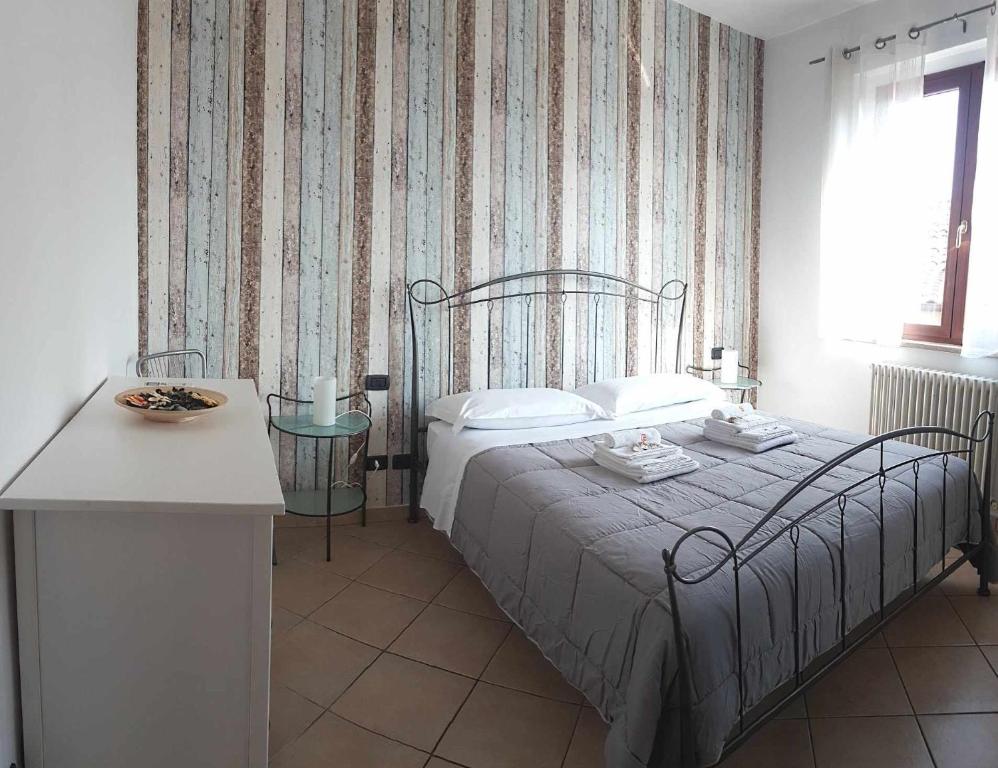 Posteľ alebo postele v izbe v ubytovaní Casa Casoni - Il Conero