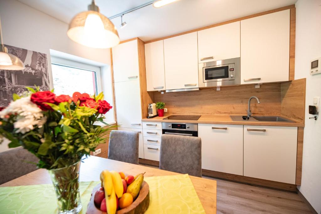 Kuchyň nebo kuchyňský kout v ubytování Appartement Gimpl