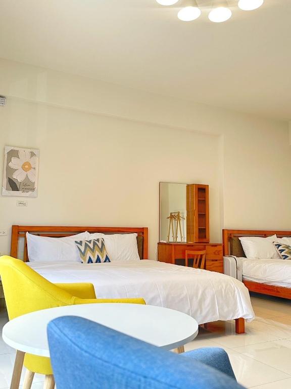 Voodi või voodid majutusasutuse Apple Homestay toas