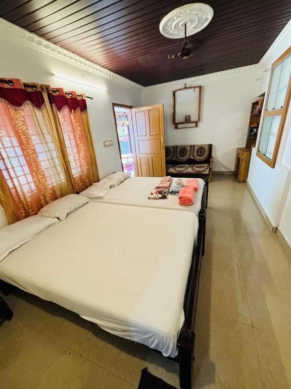 Postel nebo postele na pokoji v ubytování Marari Das Beach Villa