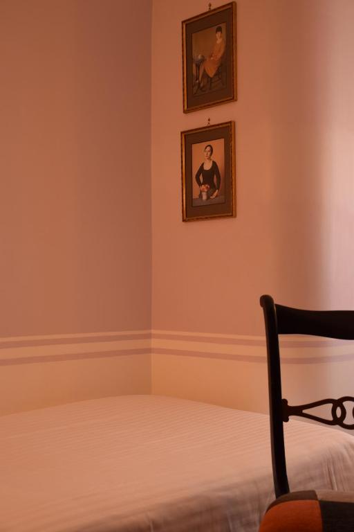 Postel nebo postele na pokoji v ubytování Hotel Lancelot