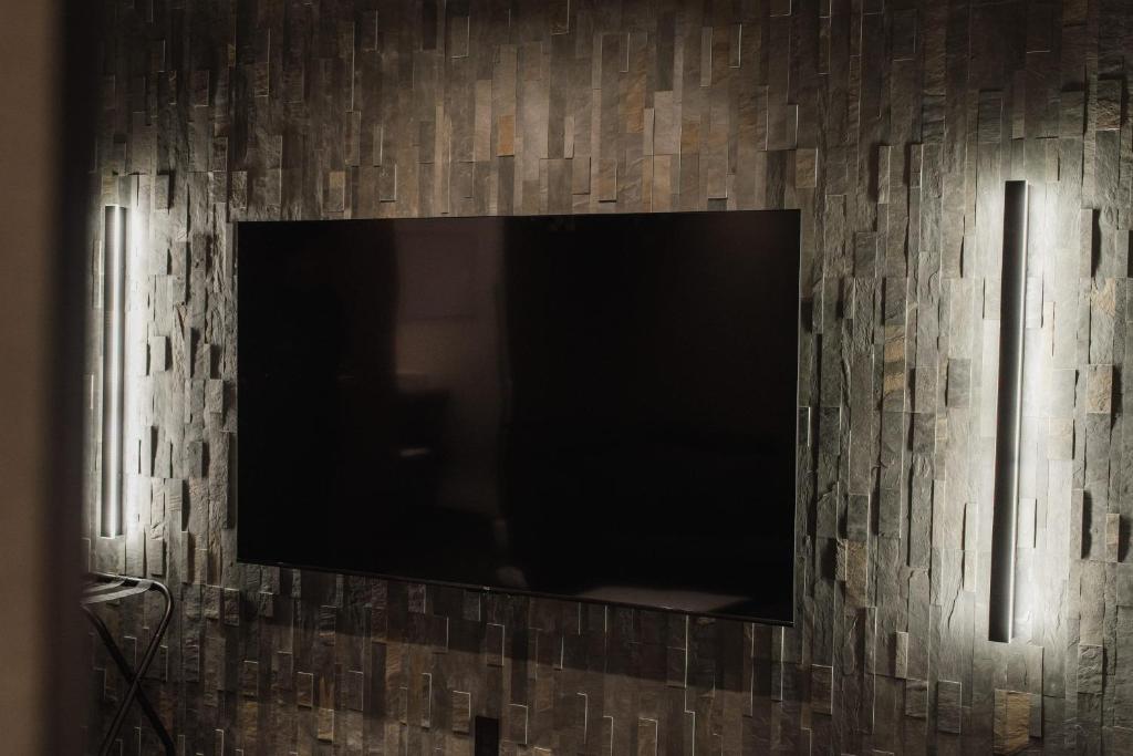 TV a/nebo společenská místnost v ubytování The LOFT INN HAKATA