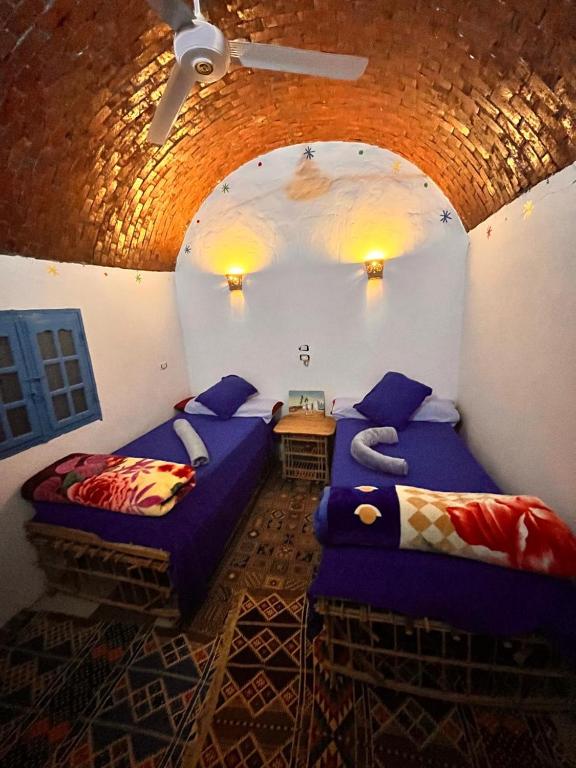 Postel nebo postele na pokoji v ubytování Wesy Ka Guest House