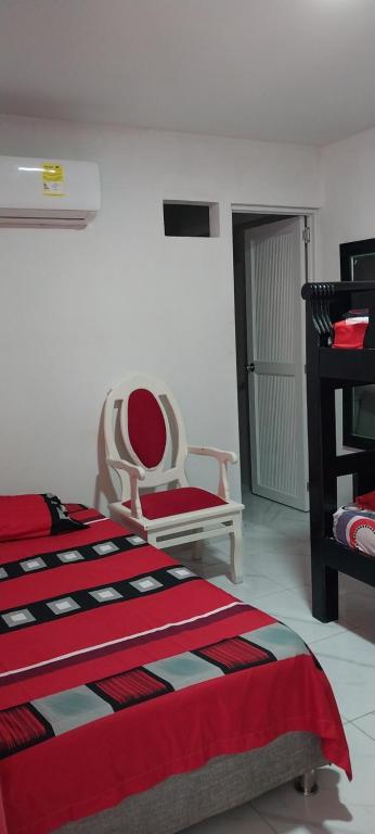 Postel nebo postele na pokoji v ubytování LA MEDELLIN HOSTAL