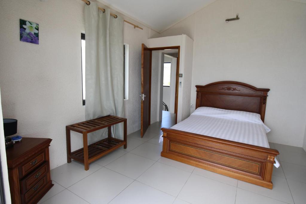 Postel nebo postele na pokoji v ubytování Villas Vetiver